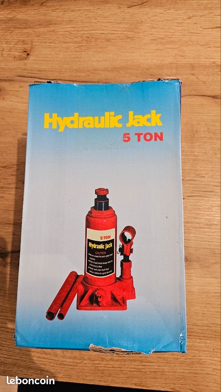Cric hydraulique bouteille d'une capacité de levage de 5 tonnes.